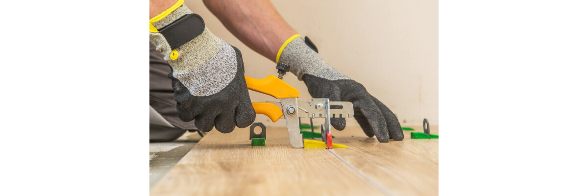 Perfekt eben Fliesen verlegen – mit dem Fliesen-Nivelliersystem - Fliesen Nivelliersystem – Perfekt ebene Flächen wie vom Profi